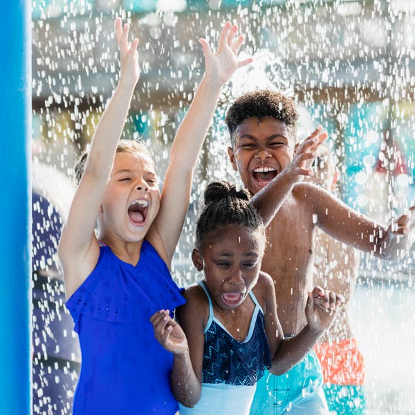 children playing in pool
